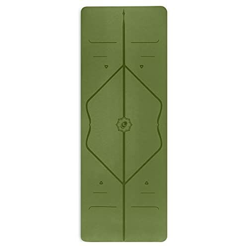 Green yoga mat with alignment guides.