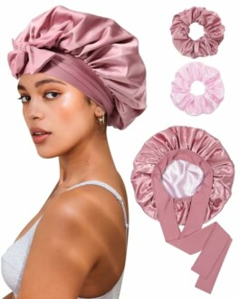 Woman wearing satin bonnet with hair scrunchies.